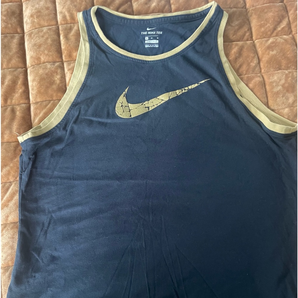 Nike black and gold dry fit tank top size medium. Pre-owned good condition.